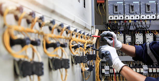 Professional Electrician technician working in Houston, TX